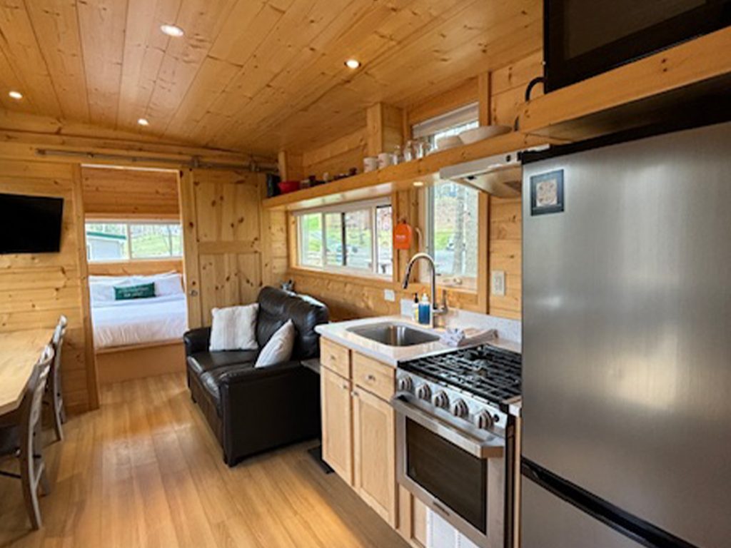 Kitchen long view of the Hideout a Tiny House