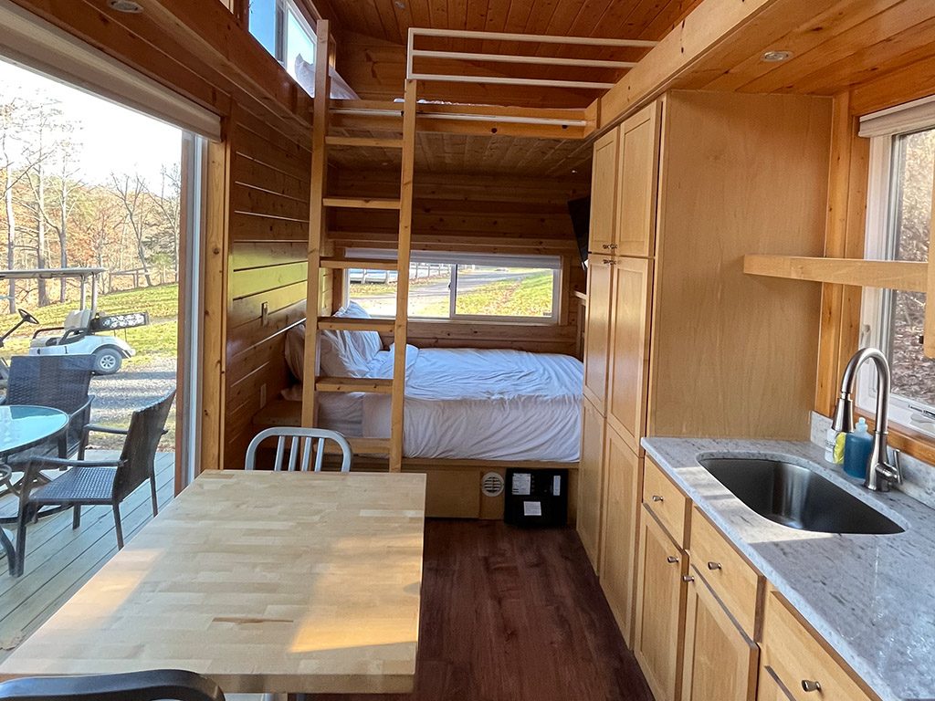 view of the queen bed with twin on top